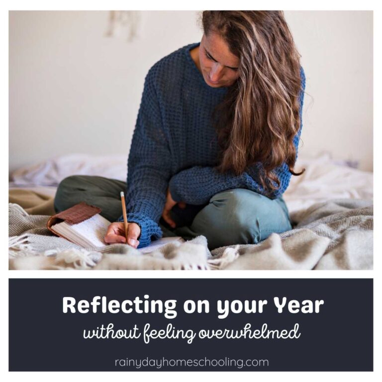 A woman sitting on her bed writing in a journal. The text below reads Reflecting on Your Year, without feeling overwhelmed.
